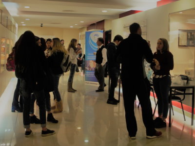 Awaiting the session to start - students outside the auditorium